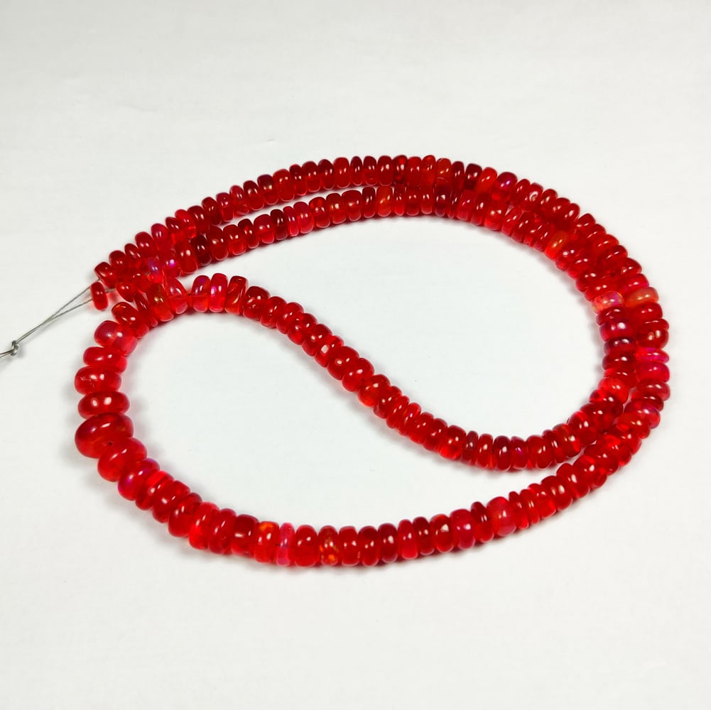 64.00 Ct Natural Orange Fire Opal Round Beads: Weight - 64.00 Ct / Dimensions - 4.40 - 8.50 mm / 160 Pc's / Shape - Round Cut Beads / Color - Orange / Clarity - Translucent / Origin - Ethiopia / Treatment - Color Heated