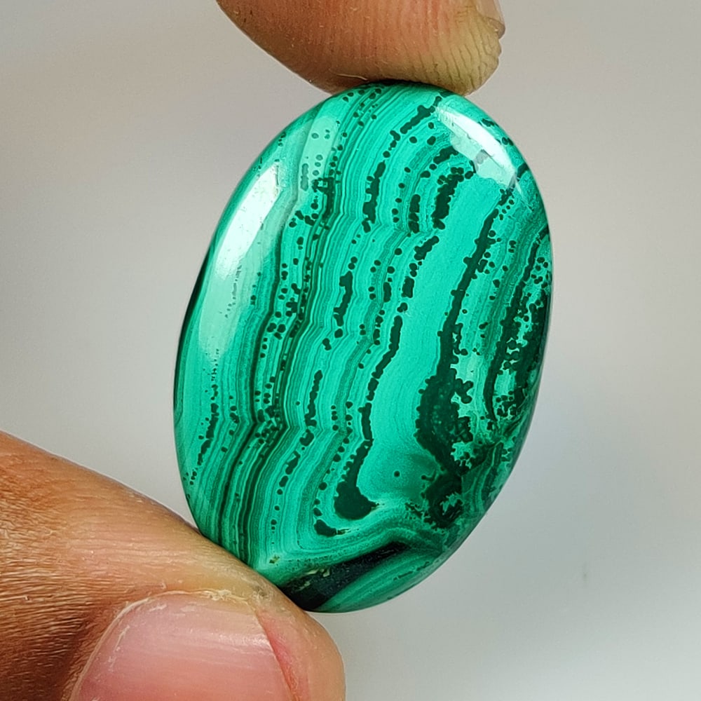 24.89 Ct Natural Green Malachite Oval Cab (1 of 2)