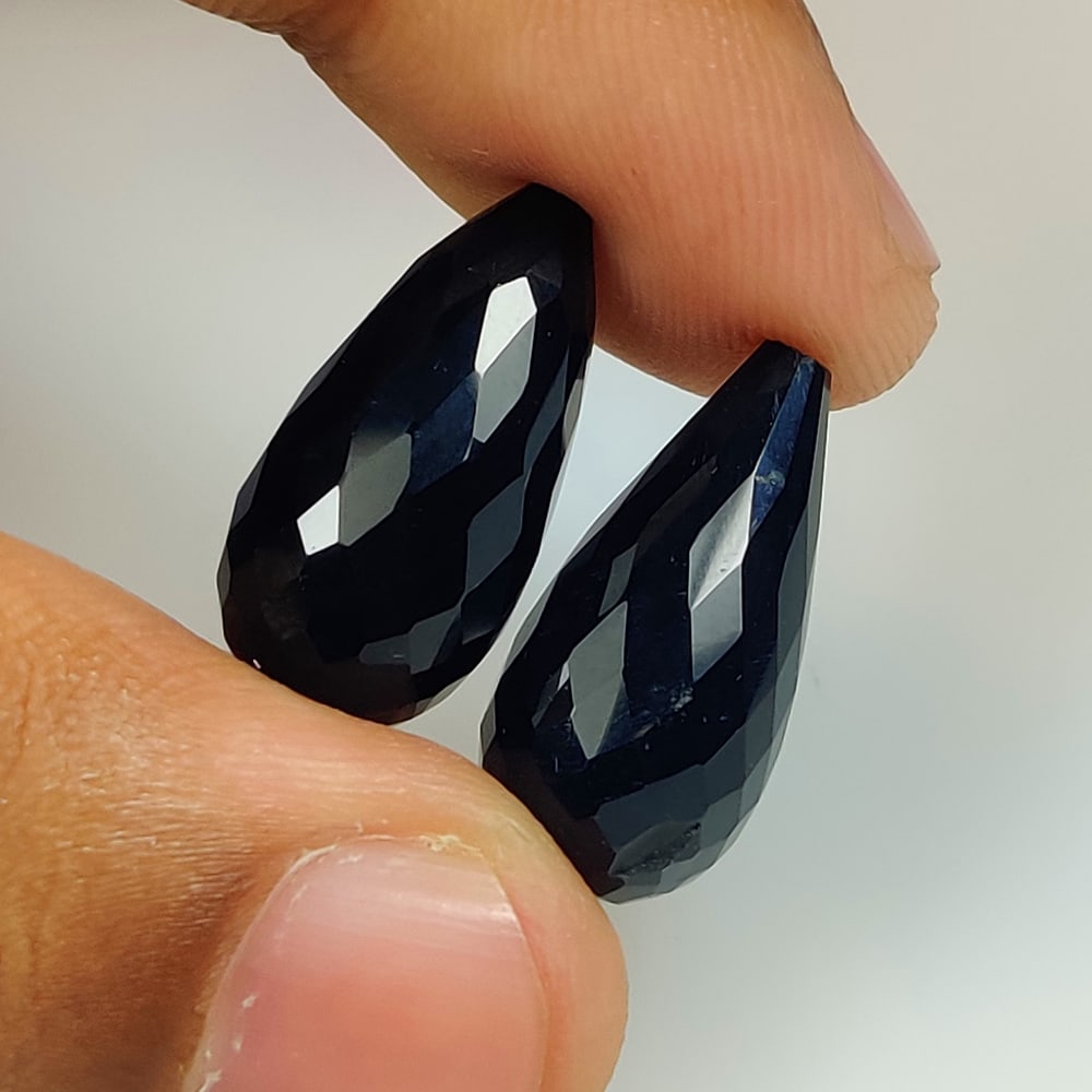 25.48 Ct Natural Black Onyx Pear Drop Pair: Weight - 25.48 Ct / Dimensions - 20.20 x 10.10 x 10.10 mm / 2 Pc's / Shape - Pear Drop / Clarity - Opaque / Origin - Brazil / Treatment - None