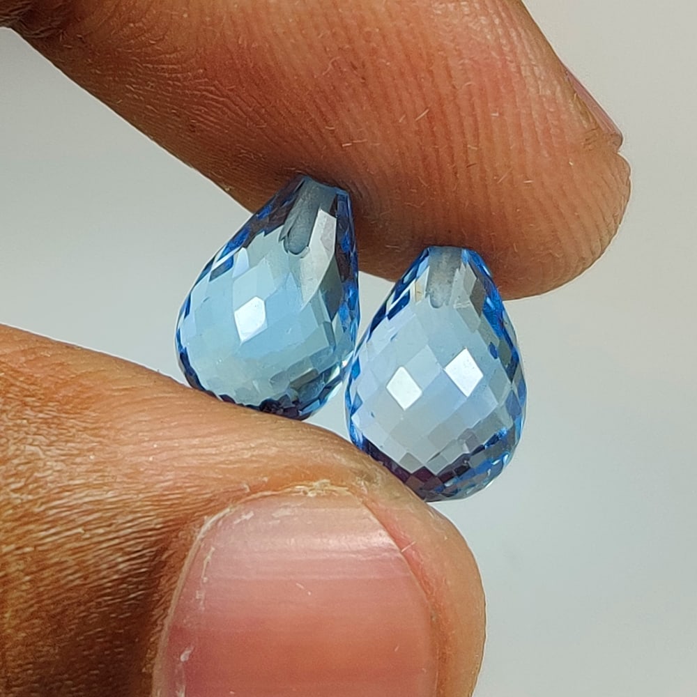 8.48 Ct Natural Blue Topaz Pear Drop Beads: Weight - 8.48 Ct / Dimensions - 10.20 x 7.00 x 7.00 mm / 2 Pc's / Shape - Pear Drop Beads / Color - Blue / Clarity - VVS / Origin - Brazil / Treatment - Irradiated
