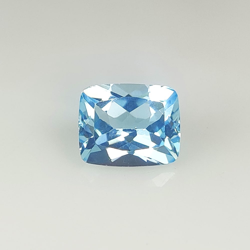 7.52 Ct Natural Blue Topaz Cushion Cut: Weight - 7.52 Ct / Dimensions - 12.20 x 10.10 x 6.90 mm / Shape - Cushion Cut / Color - Blue / Clarity - VVS / Origin - Brazil / Treatment - Irradiated