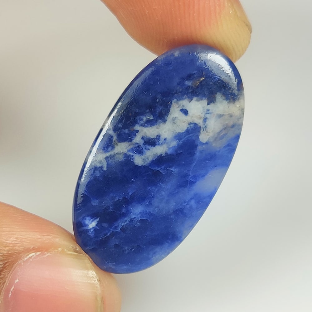 16.22 Ct Natural Blue Sodalite Oval Cab (1 of 2)