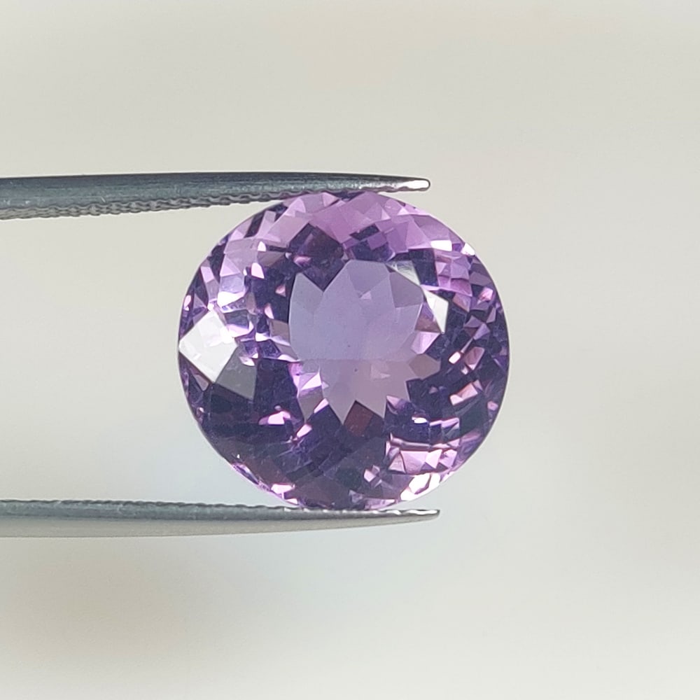 10.04 Ct Natural Purple Amethyst Round Cut: Weight - 10.04 Ct / Dimensions -14.30 x 13.90 x 9.30 mm / Shape - Round Cut / Color - Purple / Clarity - VVS / Origin -Brazil / Treatment - Heated