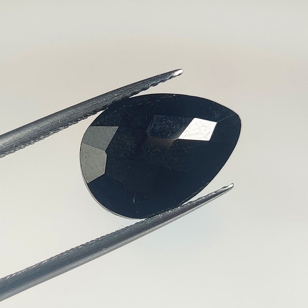 5.45 Ct Natural Black Onyx Pear Cut: Weight - 5.45 Ct / Size - 14.00 x 9.80 x 4.50 mm / Shape - Pear Cut / Clarity - Opaque / Origin - Brazil / Treatment - None
