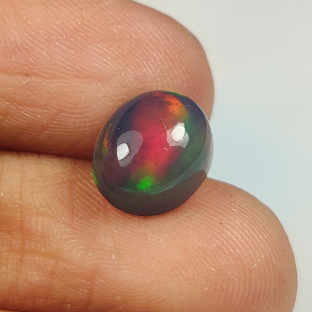 1.42 Ct Natural Black Flashing Fire Opal Oval Cab (1 of 4)