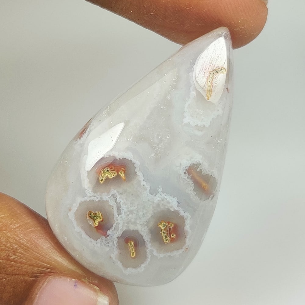 29.07 Ct Natural Solar Coral Pear Cab (1 of 2)