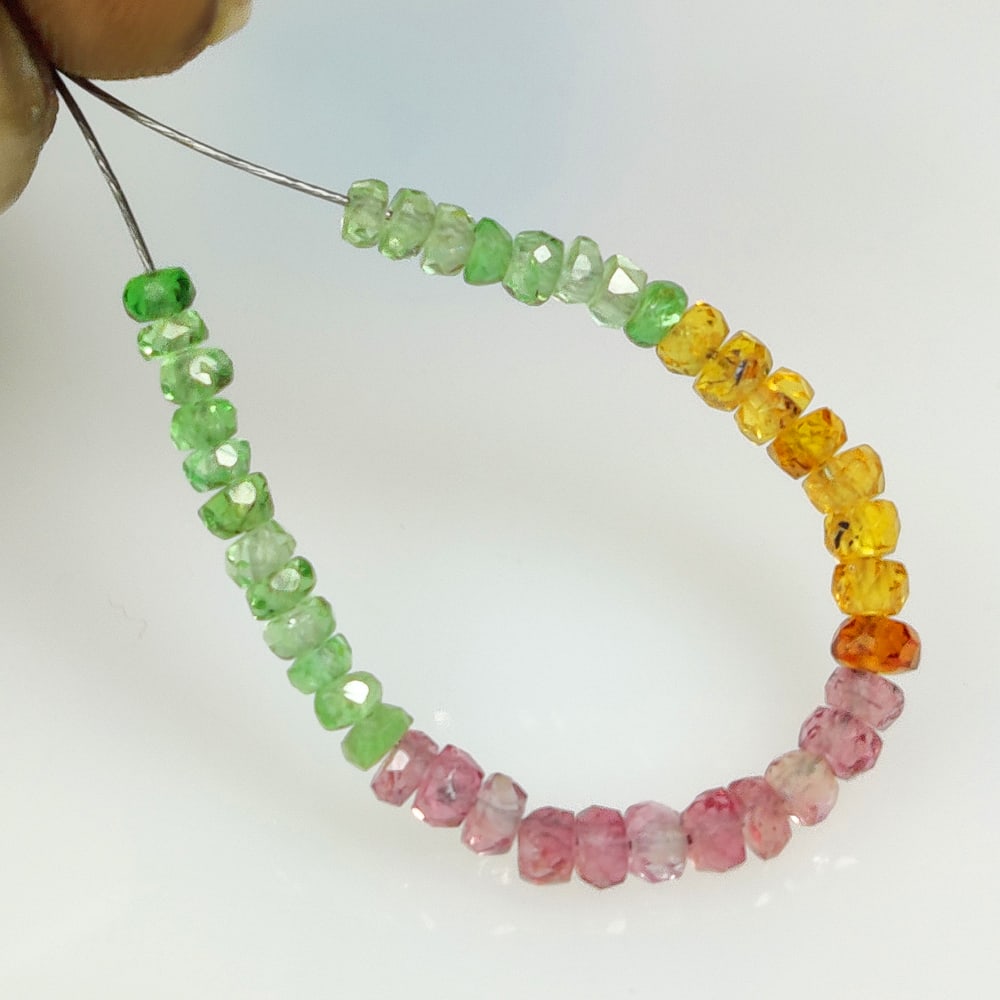 3.72 Ct Natural Tsavorite, Spessarite, Rhodolite Garnet Round Cut Beads: Weight - 3.72 Ct / Size - 2.30 - 2.70 mm / 39 Pc's / Shape - Round Cut Beads / Clarity - VVS / Origin - Nigeria / Treatment - None