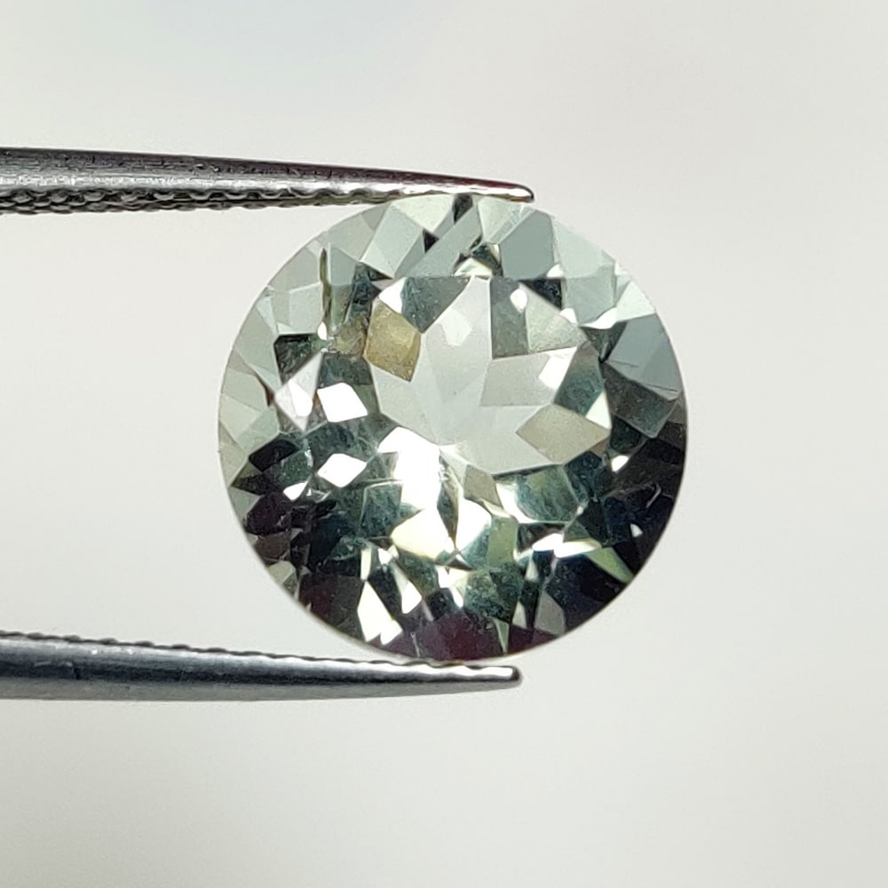 5.28 Ct Natural Green Amethyst Round Cut: Weight - 5.28 Ct / Size - 11.10 x 11.10 x 7.90 mm / Shape - Round Cut / Color - Green / Clarity - VVS / Origin - Brazil / Treatment - Heated