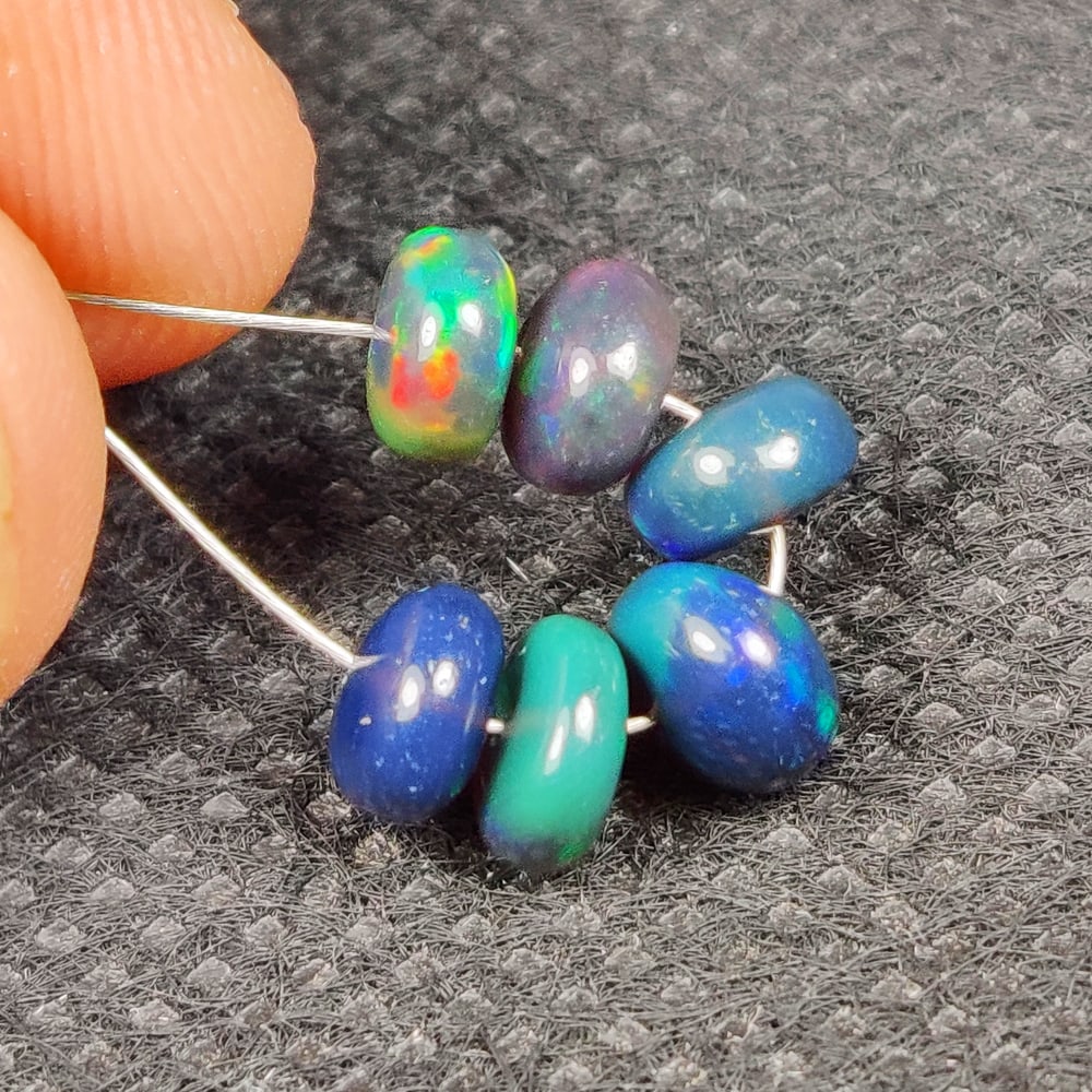 3.46 Ct Natural Black Fire Opal Round Beads: Weight - 3.46 Ct / Size - 5.70- 6.20 mm / 6 Pc's / Shape - Round Beads / Color - Black / Clarity - Translucent / Origin - Ethiopia / Treatment - Heated