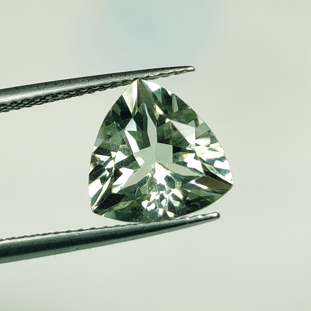 3.13 Ct Natural Green Amethyst Trillion Cut: Weight - 3.13 Ct / Size - 10.10 x 10.10 x 6.50 mm / Shape - Trillion Cut / Color - Green / Clarity - VVS / Origin - Brazil / Treatment - Heated