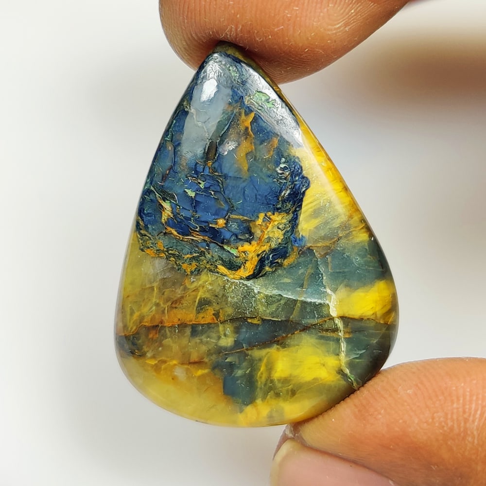 30.69 Ct Natural Neelite Pear Cab (1 of 2)