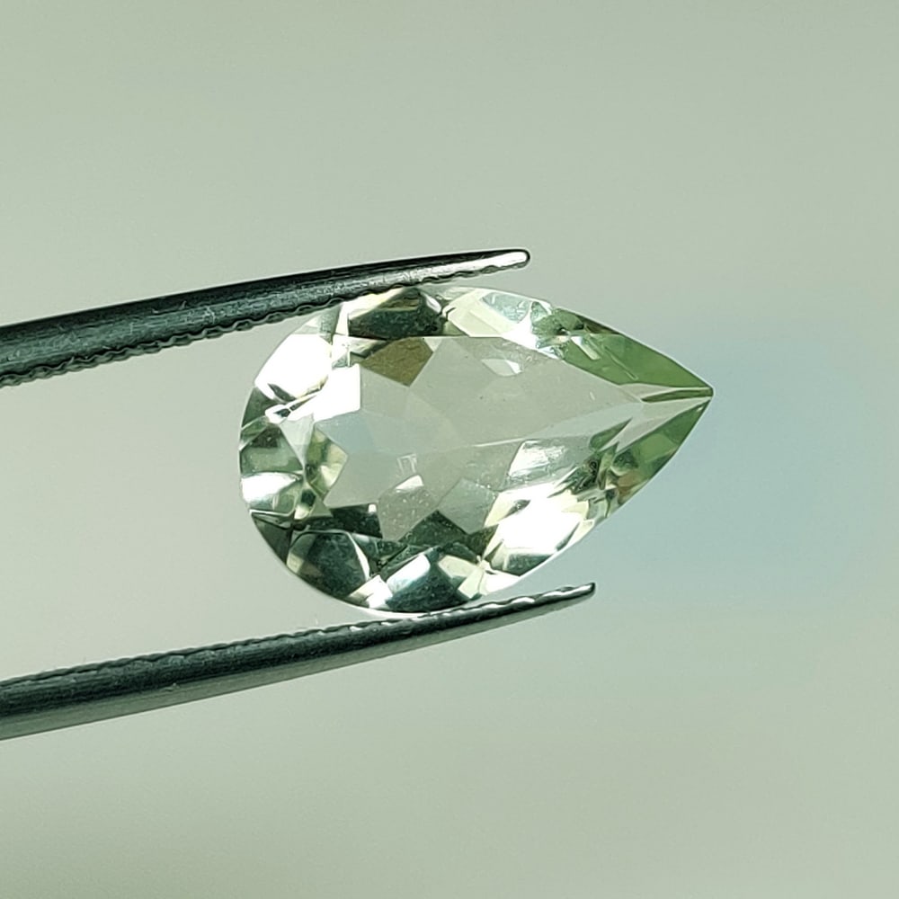 3.08 Ct Natural Green Amethyst Pear Cut: Weight - 3.08 Ct / Size - 13.10 x 8.90 x 5.20 mm / Shape - Pear Cut / Color - Green / Clarity - VVS / Origin - Brazil / Treatment - Heated