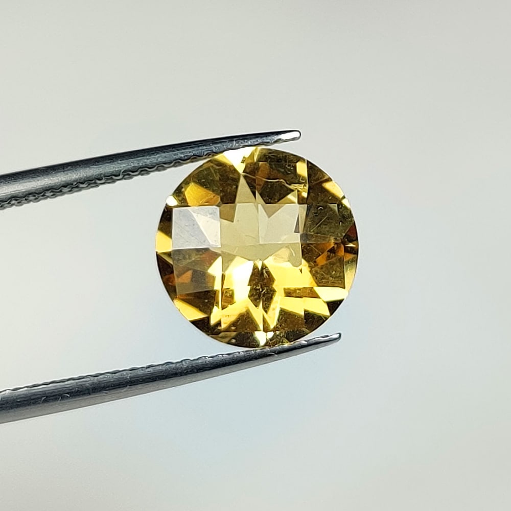 2.91 Ct Natural Yellow Citrine Round Cut: Weight - 2.91 Ct / Size - 9.90 x 9.90 x 6.20 mm / Shape - Round Cut / Color - Yellow / Clarity - VVS / Origin - Brazil / Treatment - Heated