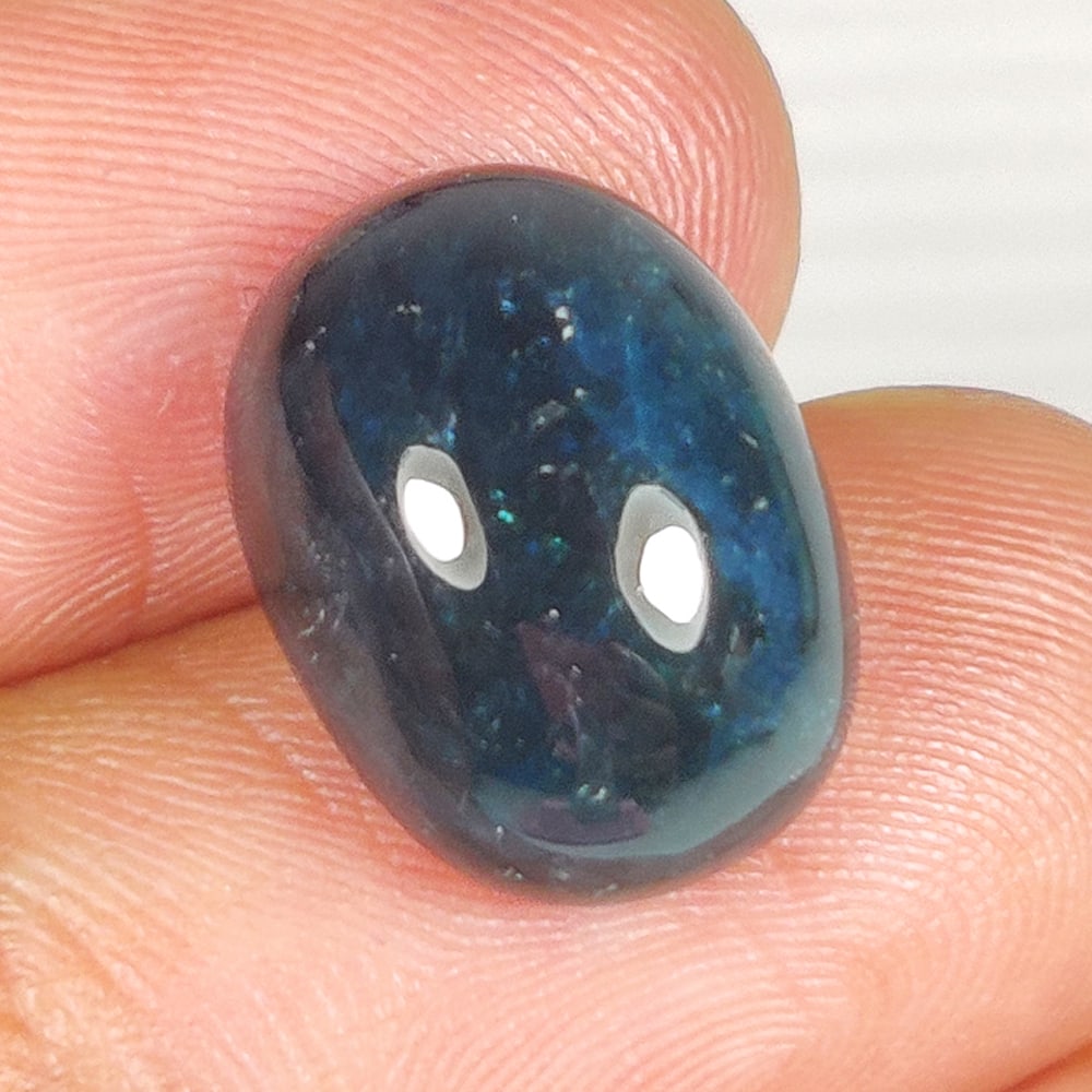 11.51 Ct Natural Grandidierite Oval Cab: Weight - 11.51 Ct / Size - 15.00 x 11.30 x 7.80 mm / Shape - Oval Cab / Clarity - Opaque / Origin - Madagascar / Treatment - None