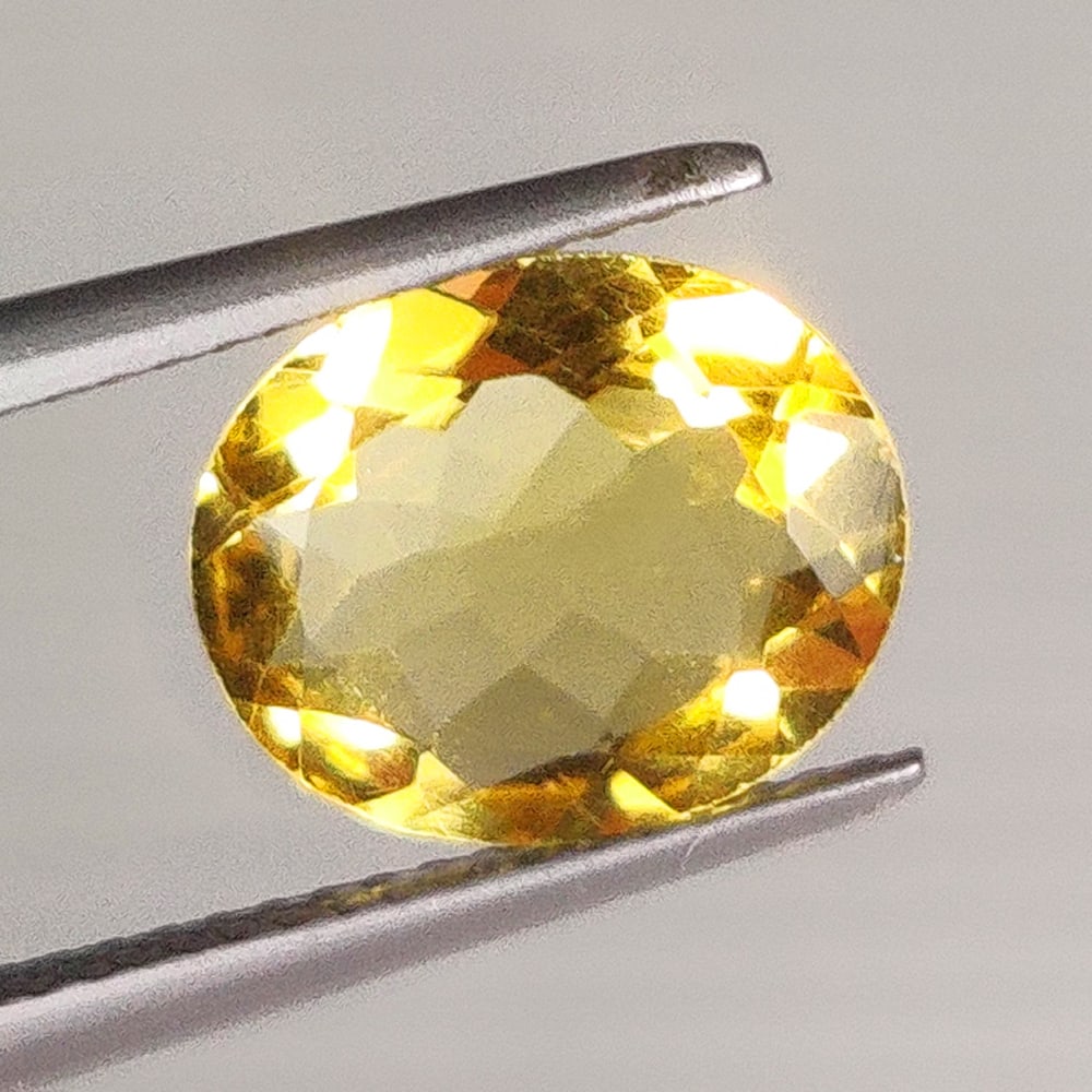 2.62 Ct Natural Yellow Citrine Oval Cut: Weight - 2.62 Ct / Size - 11.00 x 9.10 x 4.40 mm / Shape - Oval Cut / Color - Yellow / Clarity - VVS / Origin - Brazil / Treatment - Heated