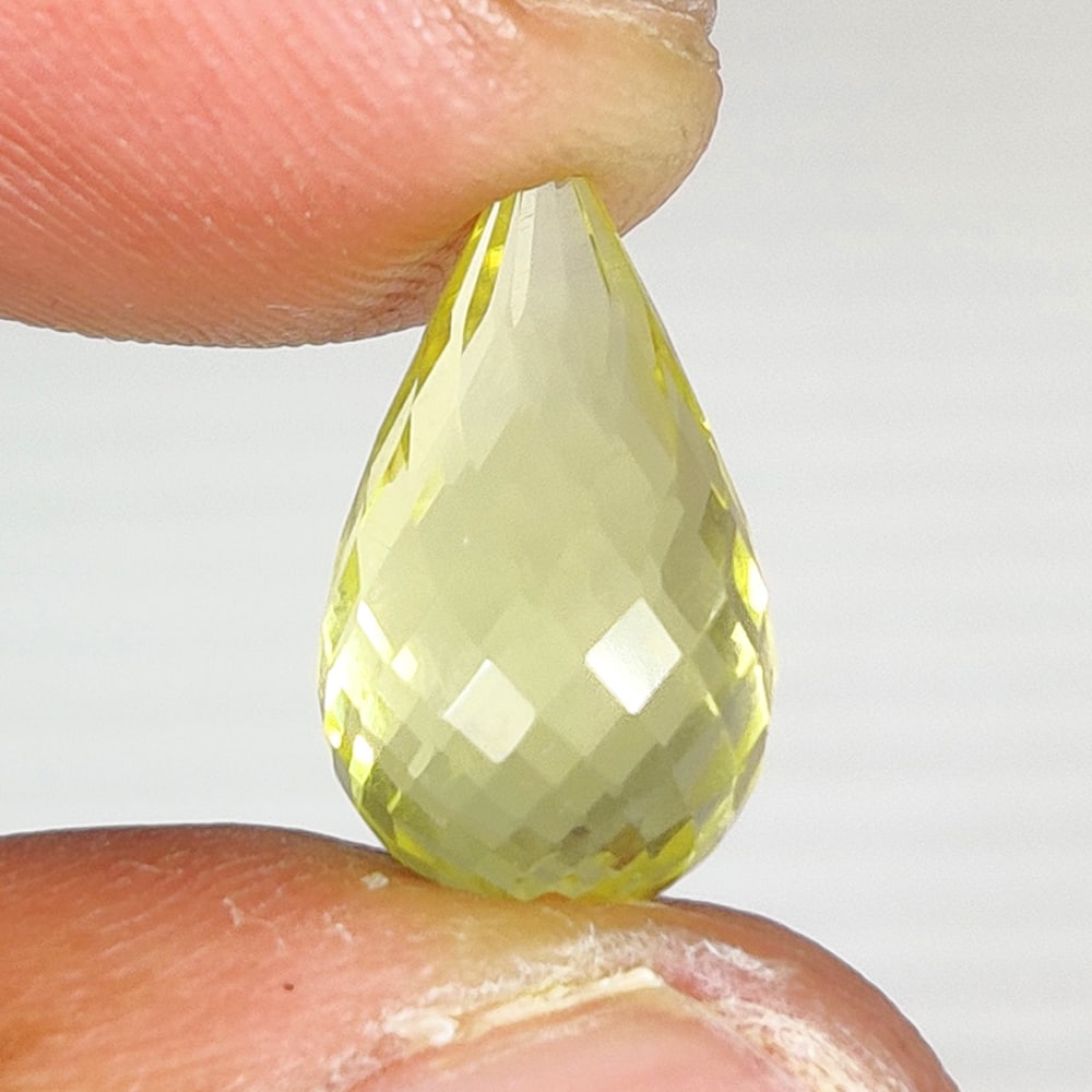 4.77 Ct Natural Lemon Quartz Pear Drop: Weight - 4.77 Ct / Dimensions - 13.10 x 8.10 x 8.10 mm / Top Quality Luster / Excellent Pear Drop / Origin - Brazil / Comments - Heated