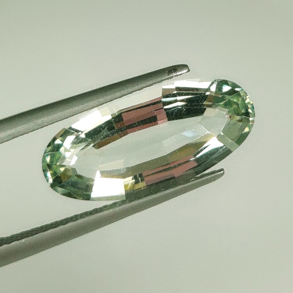 5.62 Ct Natural Green Amethyst Oval Cut: Weight - 5.62 Ct / Size - 18.00 x 8.50 x 5.80 mm / Shape - Oval Cut / Color - Green / Clarity - VVS / Origin - Brazil / Treatment - Heated