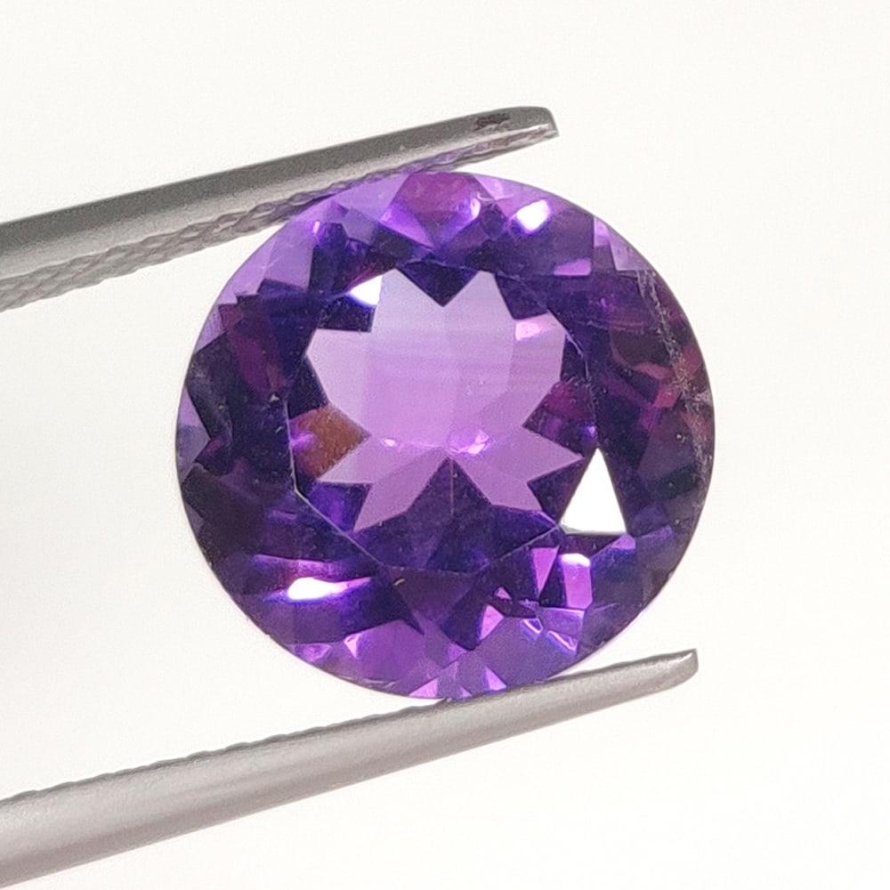 6.00 Ct Natural Purple Amethyst Round Cut: Weight - 6.00 Ct / Dimensions - 12.00 x 12.00 x 8.00 mm / Shape - Round Cut / Color - Purple / Clarity - VVS / Origin - Brazil / Treatment - Heated