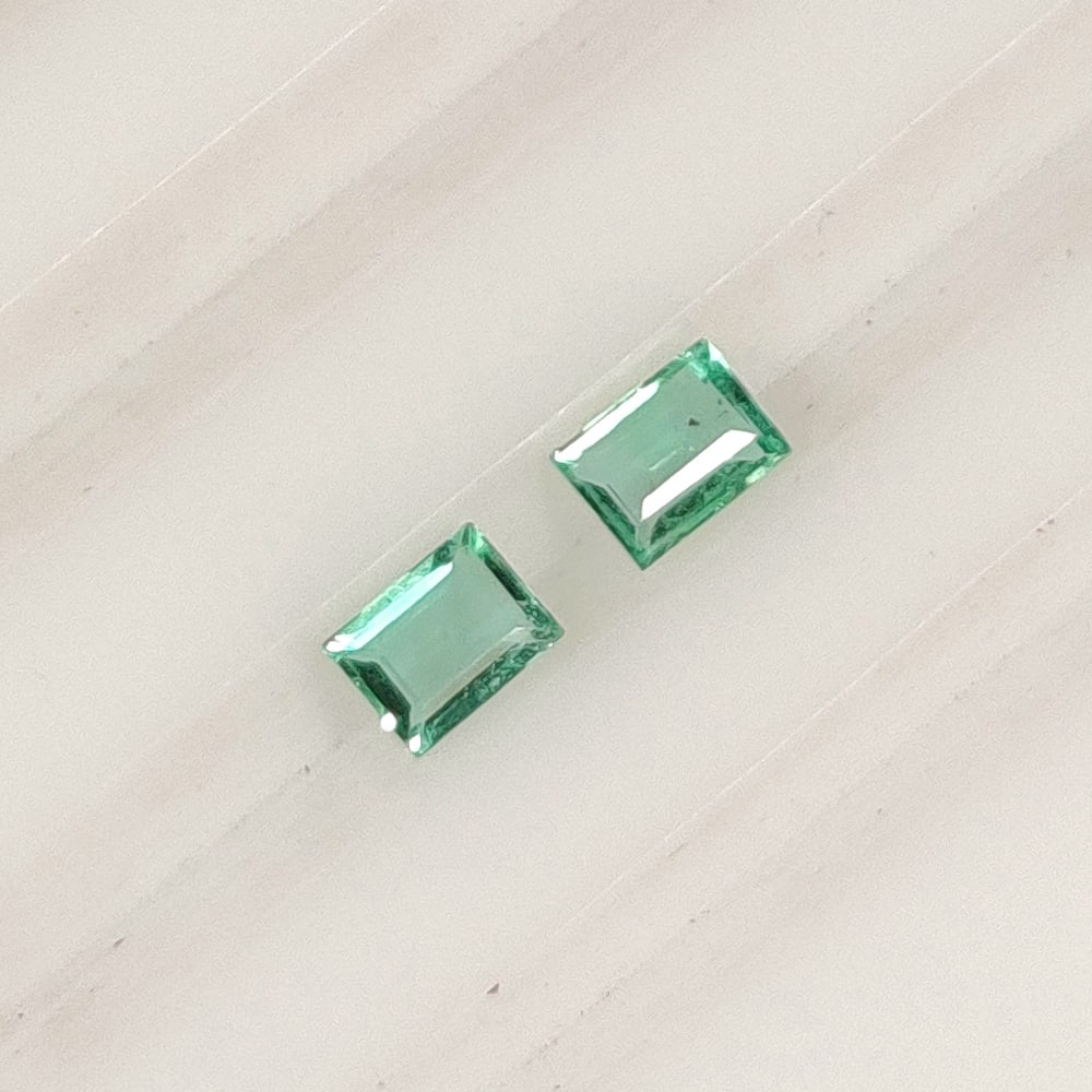 0.27 Ct Natural Zambian Green Emerald Rectangle Cut Pair (1 of 2)