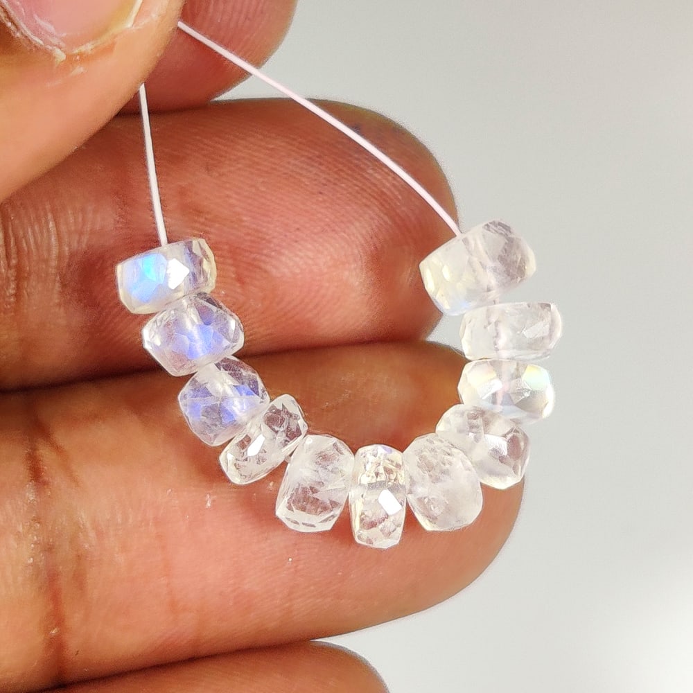 7.54 Ct Natural Blue Tint Moonstone Round Beads: Weight - 7.54 Ct / Size - 5.20 - 5.50 mm / 11 Pc's / Shape - Round Beads / Clarity - Semi-Transparent / Origin - India / Treatment - None