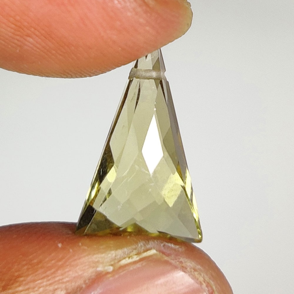 3.65 Ct Natural Lemon Quartz Fancy Cut: Weight - 3.65 Ct / Dimensions - 15.40 x 9.60 x 5.60 mm / Shape - Fancy Cut / Clarity - VVS / Origin - Brazil / Treatment - Heated