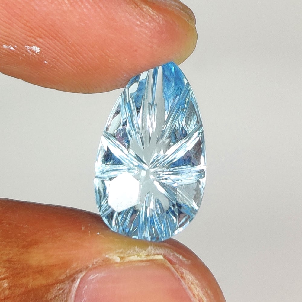 7.29 Ct Natural Blue Topaz Pear Carving (1 of 2)