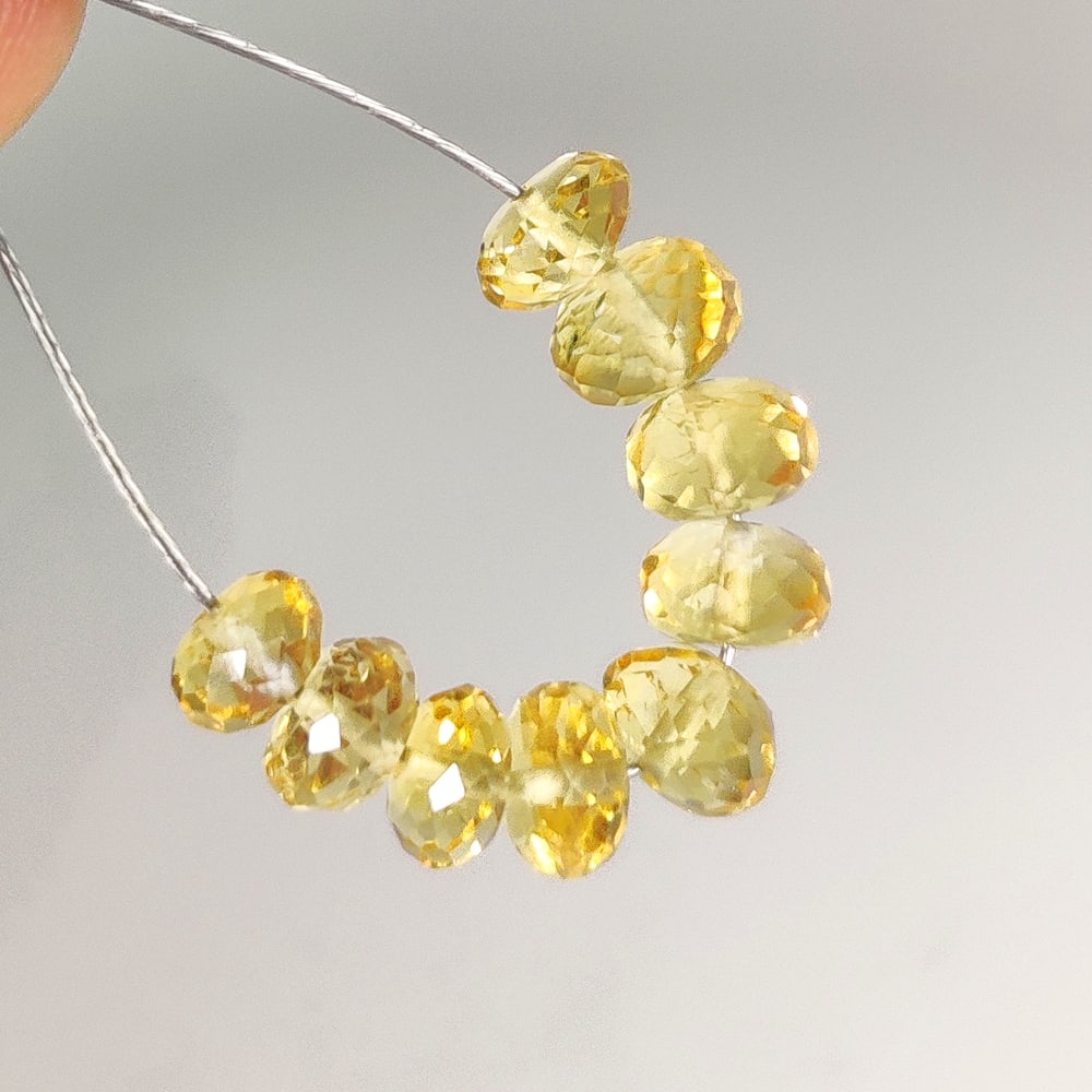 7.35 Ct Natural Citrine Round Cut Beads: Weight - 7.35 Ct / Dimensions -5.00 - 5.80 mm / 9 Pc's / Top Quality Luster / Excellent Round Cut Beads / Origin - Brazil / Treatment - Heated