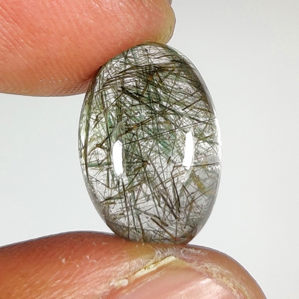 5.87 Ct Natural Rutile Quartz Oval Cab: Weight - 5.87 Ct / Size - 13.40 x 9.20 x 6.30 mm / Shape - Oval Cab / Clarity - Transparent / Origin - Norway / Treatment - None