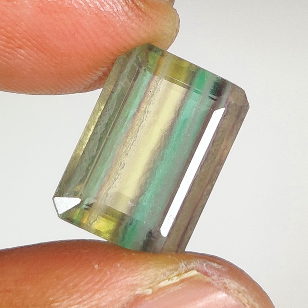 7.64 Ct Natural Multicolor Flourite Emerald Cut (1 of 2)