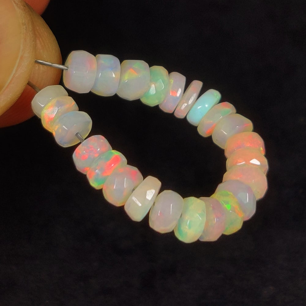 6.20 Ct Natural Multicolor Welo Opal Flash Fire Round Beads: Weight - 6.20 Ct / Dimensions - 4.10 - 4.60 mm / 24 Pc's / Shape & Cut - Drilled Round Beads / Color - Multicolor / Transparency - Translucent / Origin - Ethiopia / Comments - None