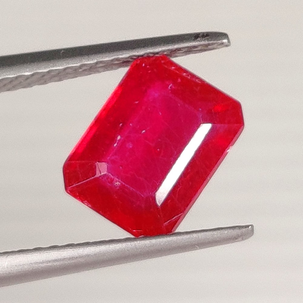 2.88 Ct Natural Pinkish Red Ruby Emerald Cut: Weight : 2.88 Ct / Dimensions - 9.00 x 7.80 x 4.00 mm / Shape : Emerald cut / Color : Pinkish Red / Transparency : Transparent / Treatment : Heated With Glassfilling