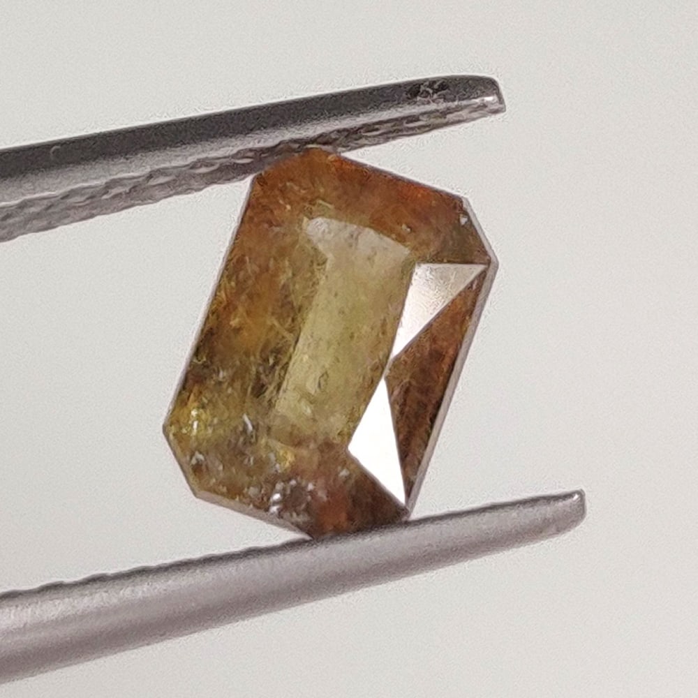 1.29 Ct Natural Axinite Octagon Cut: Weight - 1.29 Ct / Dimensions - 7.40 x 5.10 x 3.80 mm / Shape - Octagon Cut / Color - Brown / Clarity - SI / Origin - France / Treatment - None