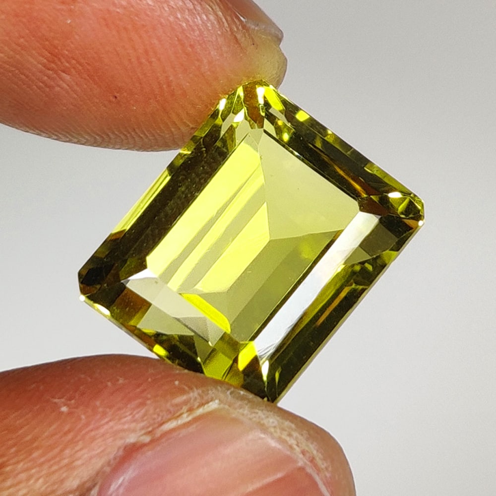 11.48 Ct Natural Lemon Quartz Octagon Cut: Weight - 11.48 Ct / Size - 14.10 x 11.50 x 8.70 mm / Top Quality Luster / Excellent Octagon Cut / Origin - Brazil / Treatment - Heated