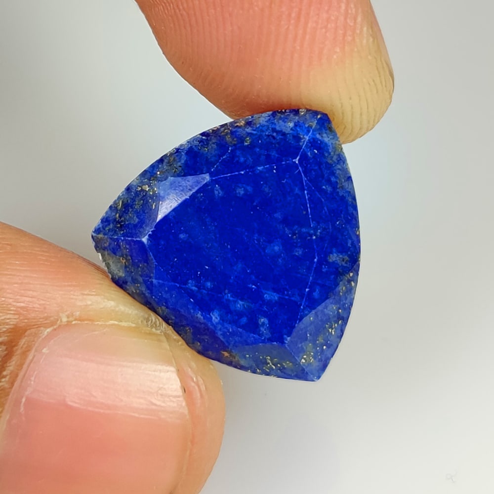13.29 Ct Natural Blue Lapis Lazuli Trillion Cut: Weight - 13.29 Ct / Dimensions - 17.00 x 16.50 x 7.50 mm / Shape - Trillion Cut / Clarity - Opaque / Origin - Afghanisthan / Treatment - None
