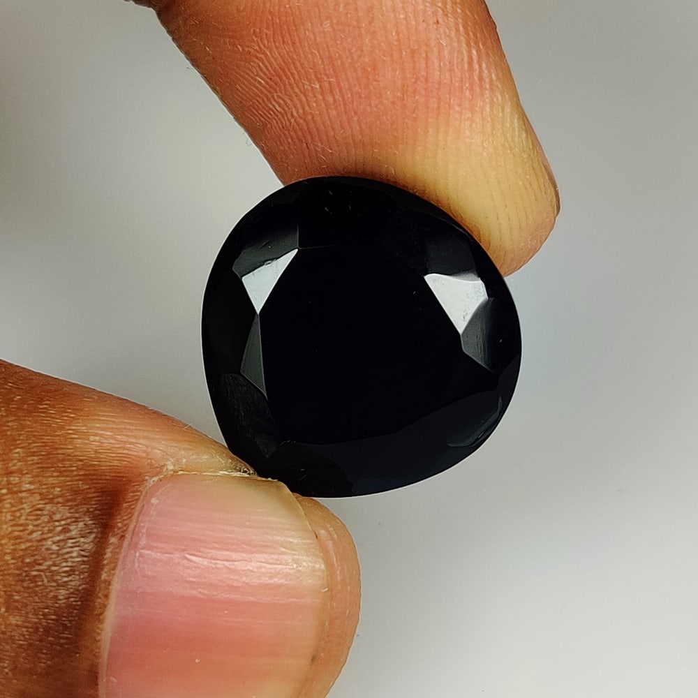 12.62 Ct Natural Black Onyx Pear Cut: Weight - 12.62 Ct / Size - 17.60 x 17.40 x 7.50 mm / Shape - Pear cut / Color - Black / Clarity - OPaque / Origin - Africa / Treatment - None