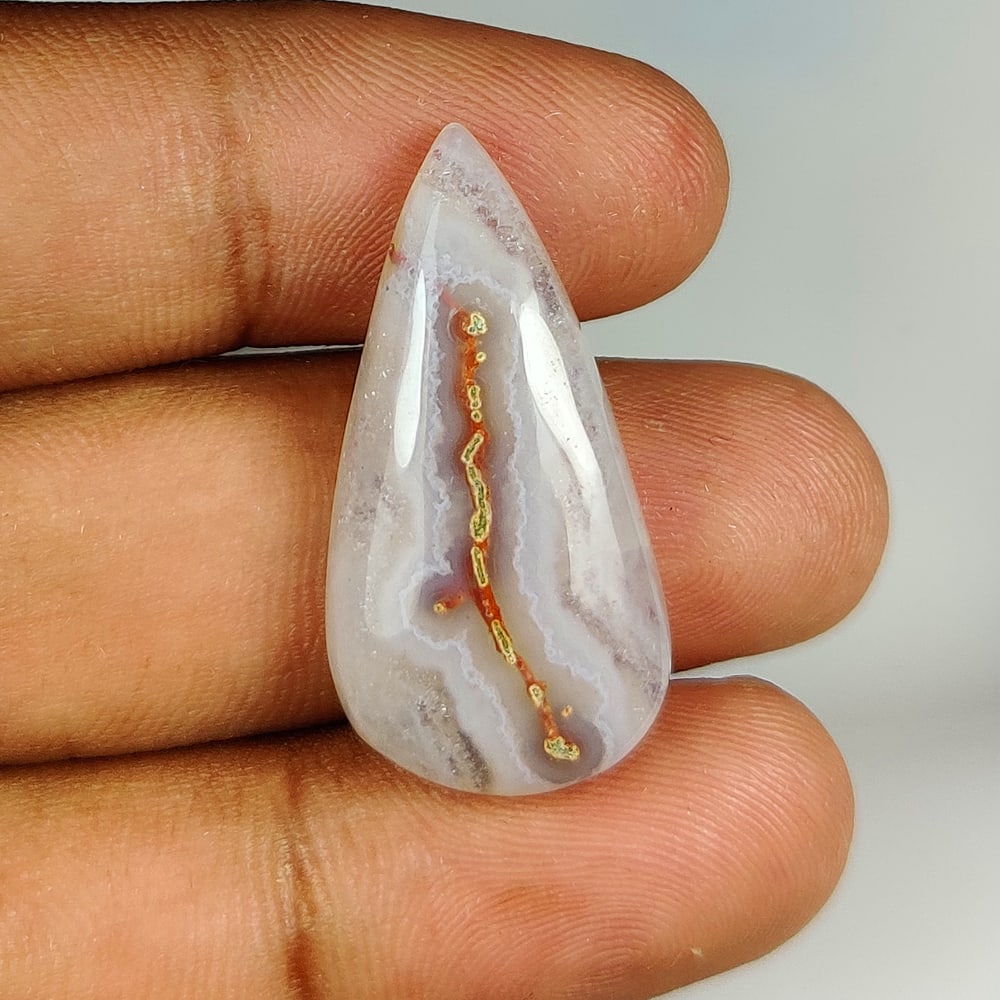 21.75 Ct Natural Solar Coral Pear Cab (1 of 2)