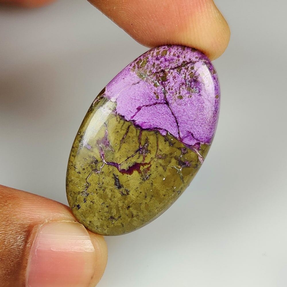 25.97 Ct Natural Stichitite Purpurite Oval Cab (1 of 2)
