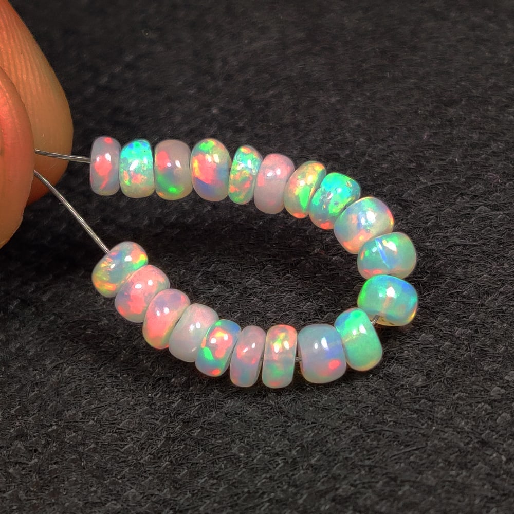 4.46 Ct Natural Multicolor Welo Opal Flash Fire Round Beads: Weight - 4.46 Ct / Dimensions - 4.10 - 4.30 mm / 20 Pc's / Shape & Cut - Drilled Round Beads / Color - Multicolor / Transparency - Translucent / Origin - Ethiopia / Comments - None