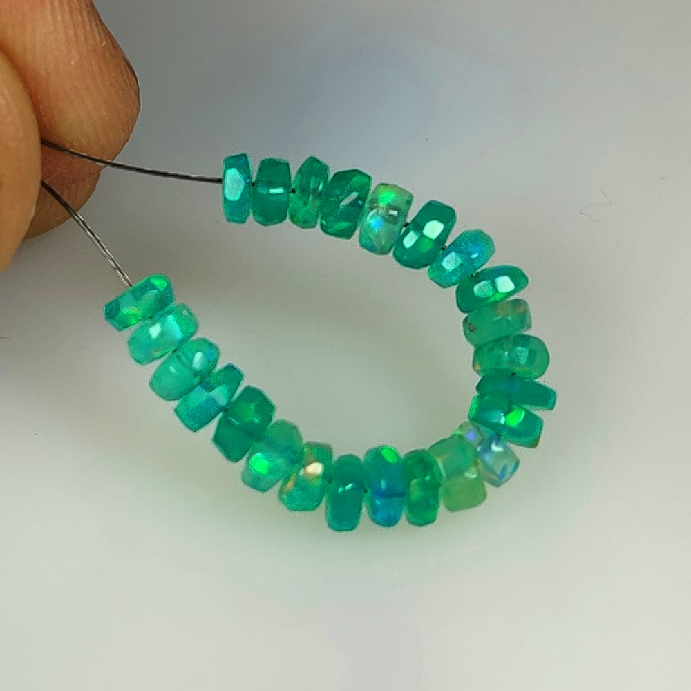 4.23 Ct Natural Green Fire Opal Round Beads: Weight - 4.23 Ct / Size - 3.80 - 4.30 mm / 24 Pc's / Shape - Round Beads / Clarity - Transparent / Origin - Ethiopia / Treatment - Heated