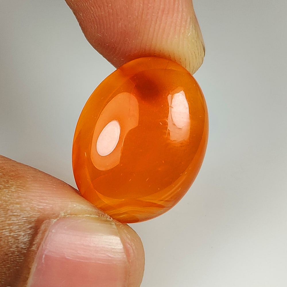 13.40 Ct Natural Orange Carnelian Oval Cab (1 of 2)