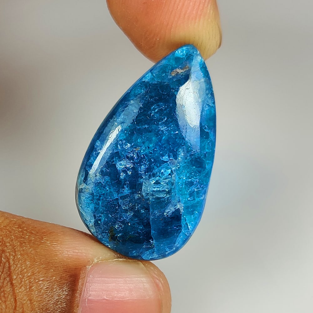 22.61 Ct Natural Blue Apatite Pear Cab: Weight - 22.61 Ct / Dimensions - 29.00 x 17.00 x 5.00 mm / Top Class Quality / Pear Cab / Origin - Brazil / Treatment - None