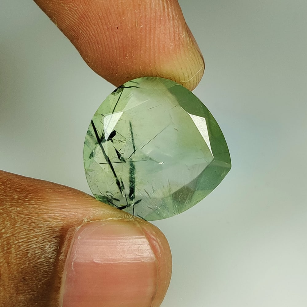 13.11 Ct Natural Rutile Prehnite Pear Cut: Weight - 13.11 Ct / Size - 18.20 x 17.90 x 6.30 mm / Shape - Pear Cut / Clarity - Transparent / Origin - Brazil / Treatment - None