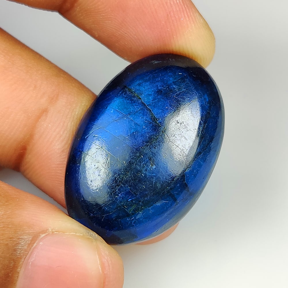 42.19 Ct Natural Blue Shaded Labradorite OVal Cab: Weight - 42.19 Ct / Size 33.00 x 21.40 x 7.30 mm / Shape - Excellent OVal Cab / Clarity - Opaque / Origin - Africa / Treatment - None