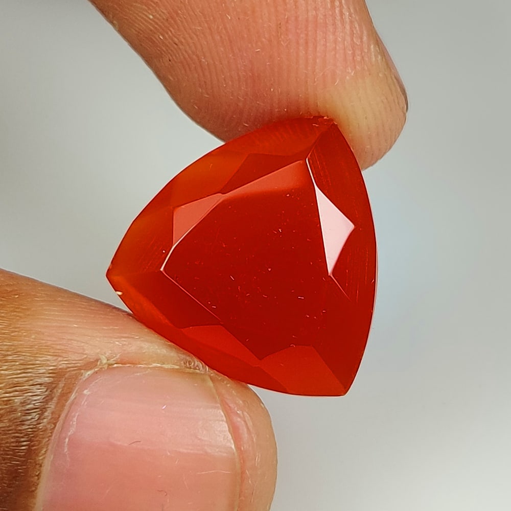 11.32 Ct Natural Orange Onyx Trillion Cut (1 of 2)