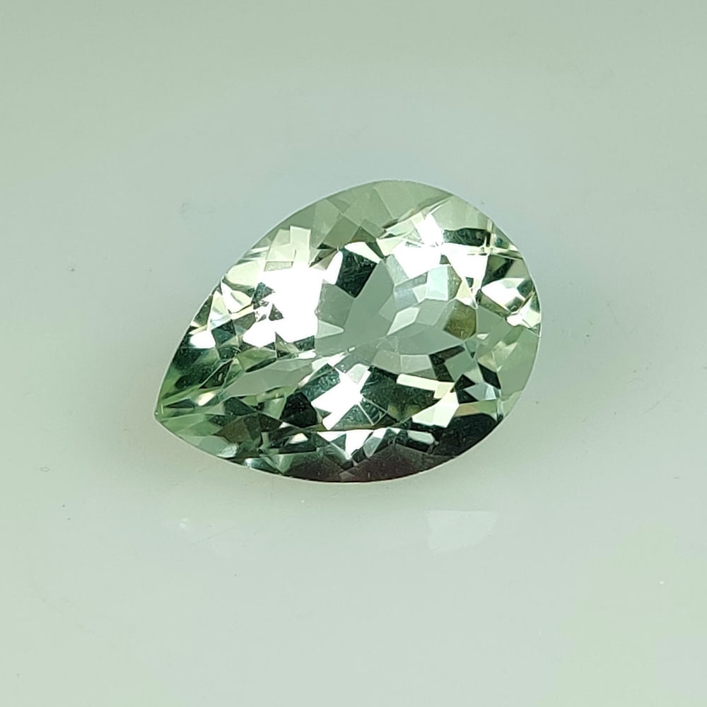 7.92 Ct Natural Green Amethyst Pear Cut: Weight - 7.92 Ct / Size -16.30 x 11.90 x 8.20 mm / Shape - Pear Cut / Color - Green / Clarity - VVS / Origin - Brazil / Treatment - Heated