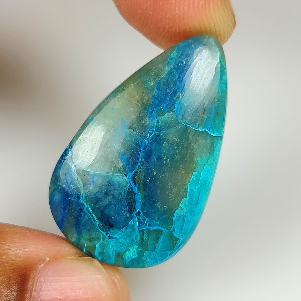 30.63 Ct Natural Shattuckite Pear Cab (1 of 2)