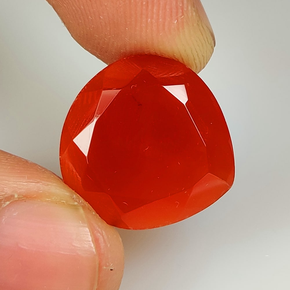 14.19 Ct Natural Orange Onyx Pear Cut: Weight - 14.19 Ct / Size - 18.10 x 7.90 x 8.00 mm / Shape - Pear Cut / Clarity - Opaque / Origin - Brazil / Treatment - None