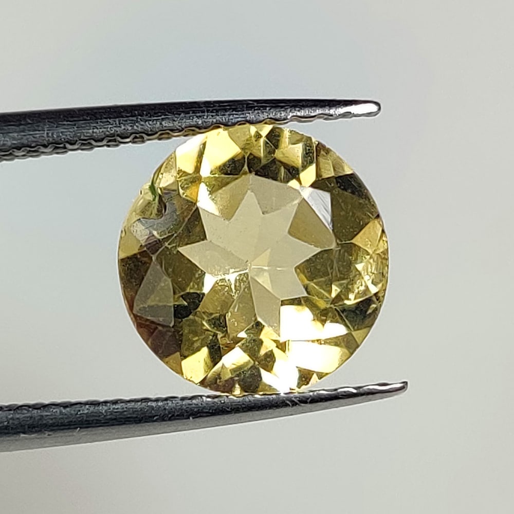 2.11 Ct Natural Yellow Citrine Round Cut: Weight - 2.11 Ct / Size - 8.90 x 8.90 x 5.30 mm / Shape - Round Cut / Color - Yellow / Clarity - VVS / Origin - Brazil / Treatment - Heated