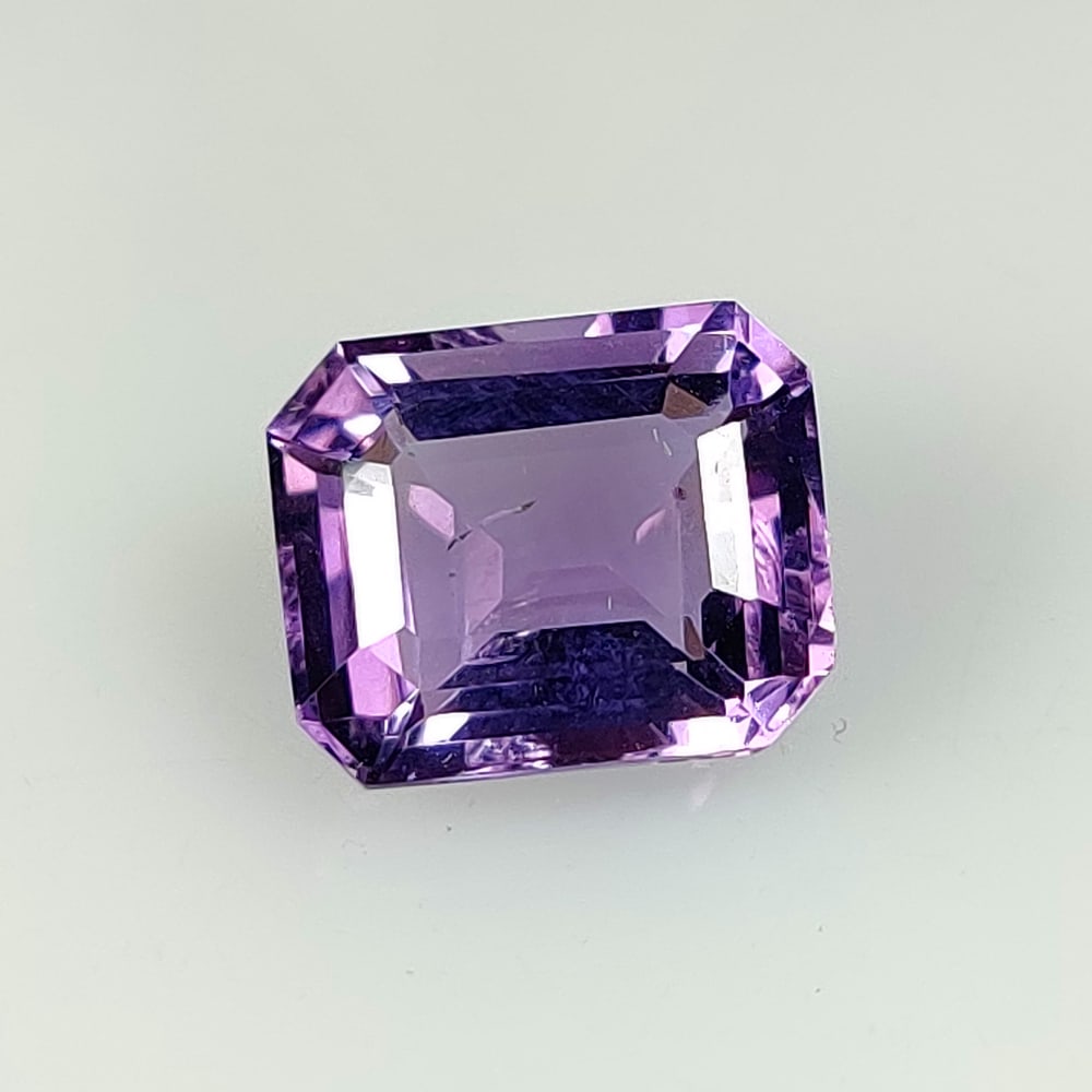 6.32 Ct Natural Purple Amethyst Octagon Cut: Weight - 6.32 Ct / Dimensions - 12.40 x 10.40 x 7.10 mm / Shape - Octagon Cut / Color - Purple / Clarity - VVS / Origin -Brazil / Treatment - Heated