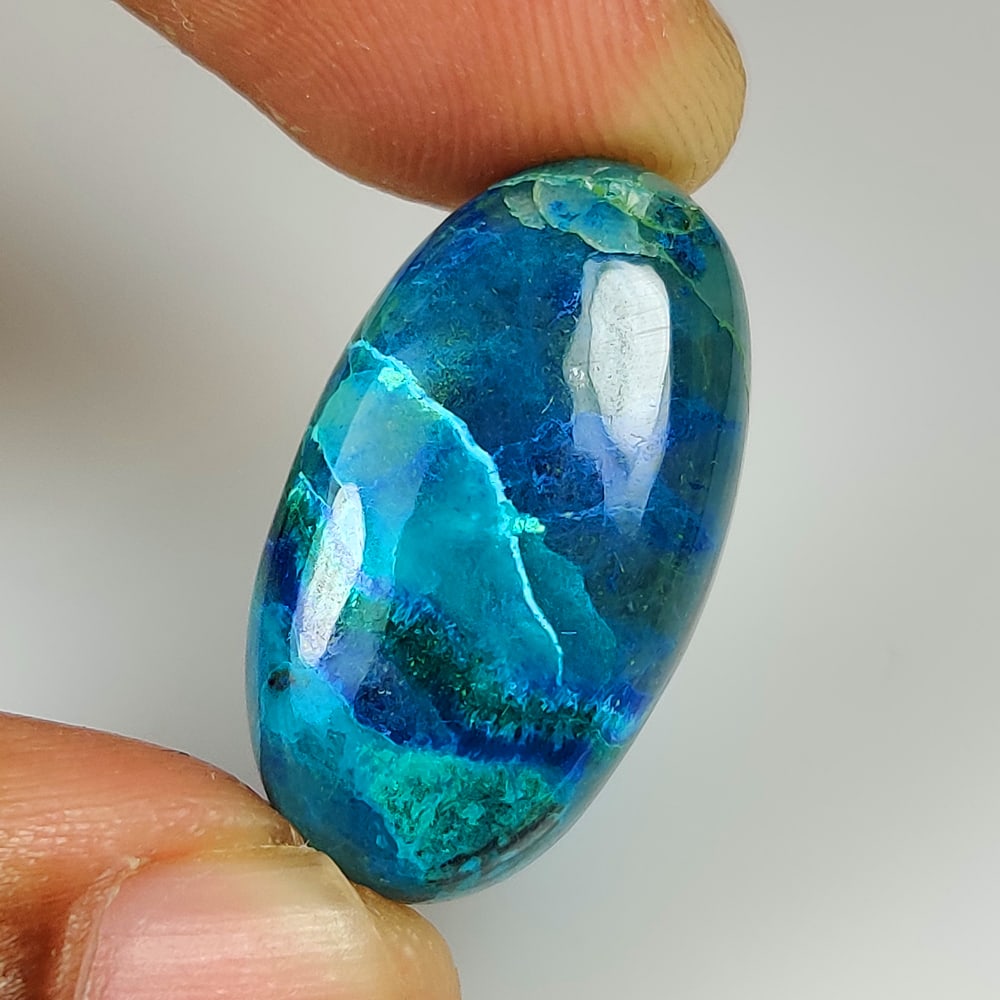 23.14 Ct Natural Shattuckite Oval Cab (1 of 2)